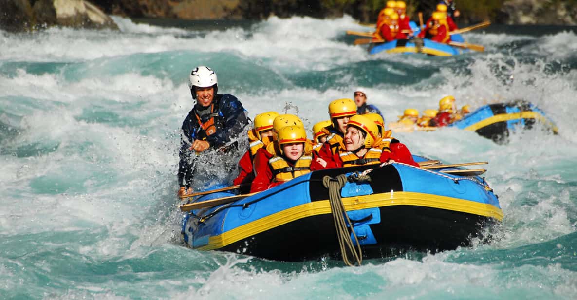 Group of tourists enjoying white water river rafting in Rishikesh Uttarakhand wearing safety gear and navigating strong rapids