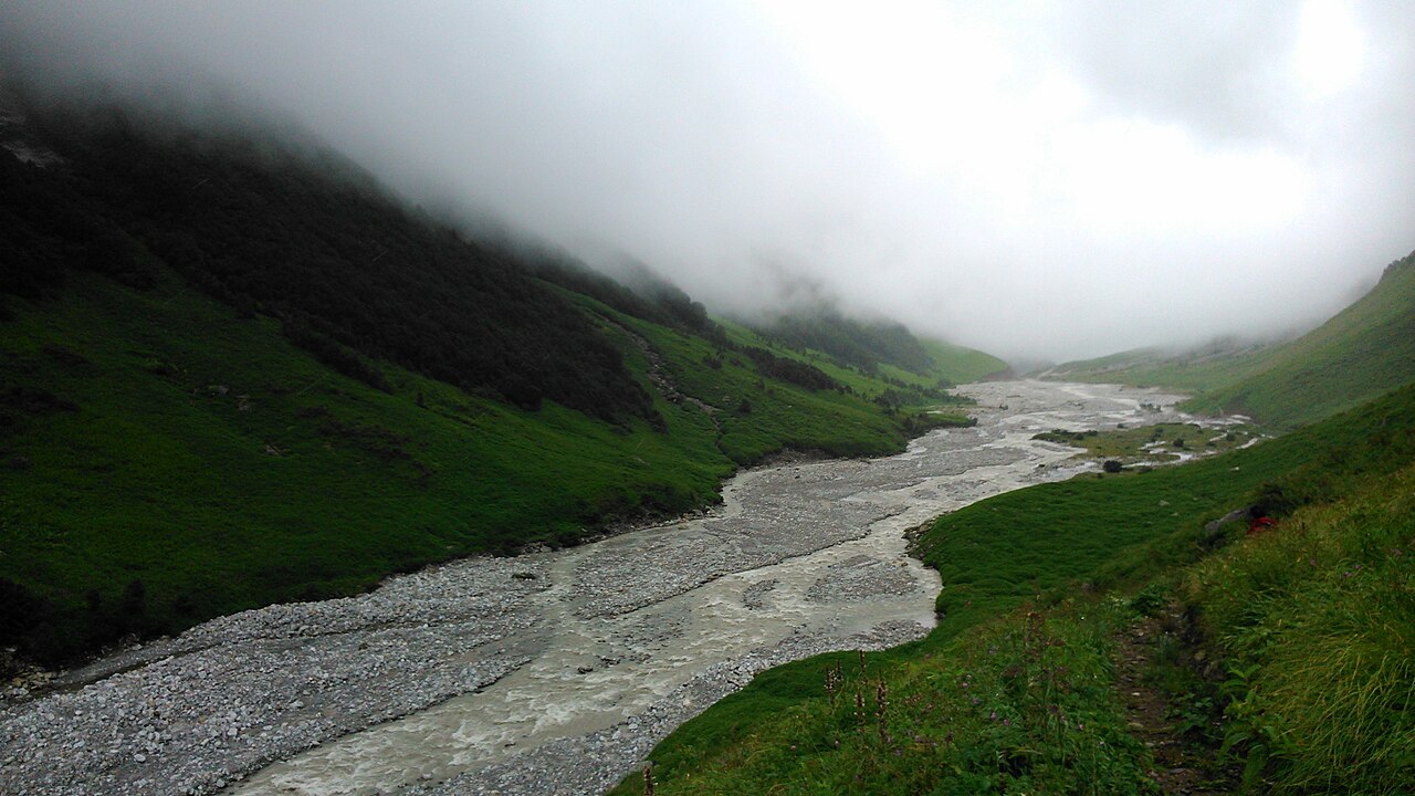 The Pushpawati river flowing through the Valley of Flowers, fed by glaciers at the valley's far end